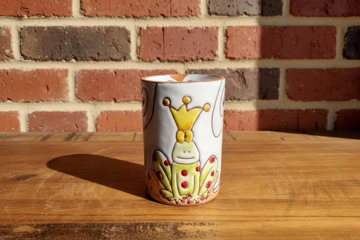 Decorative ceramic vase / toothbrush holder with a cartoon character