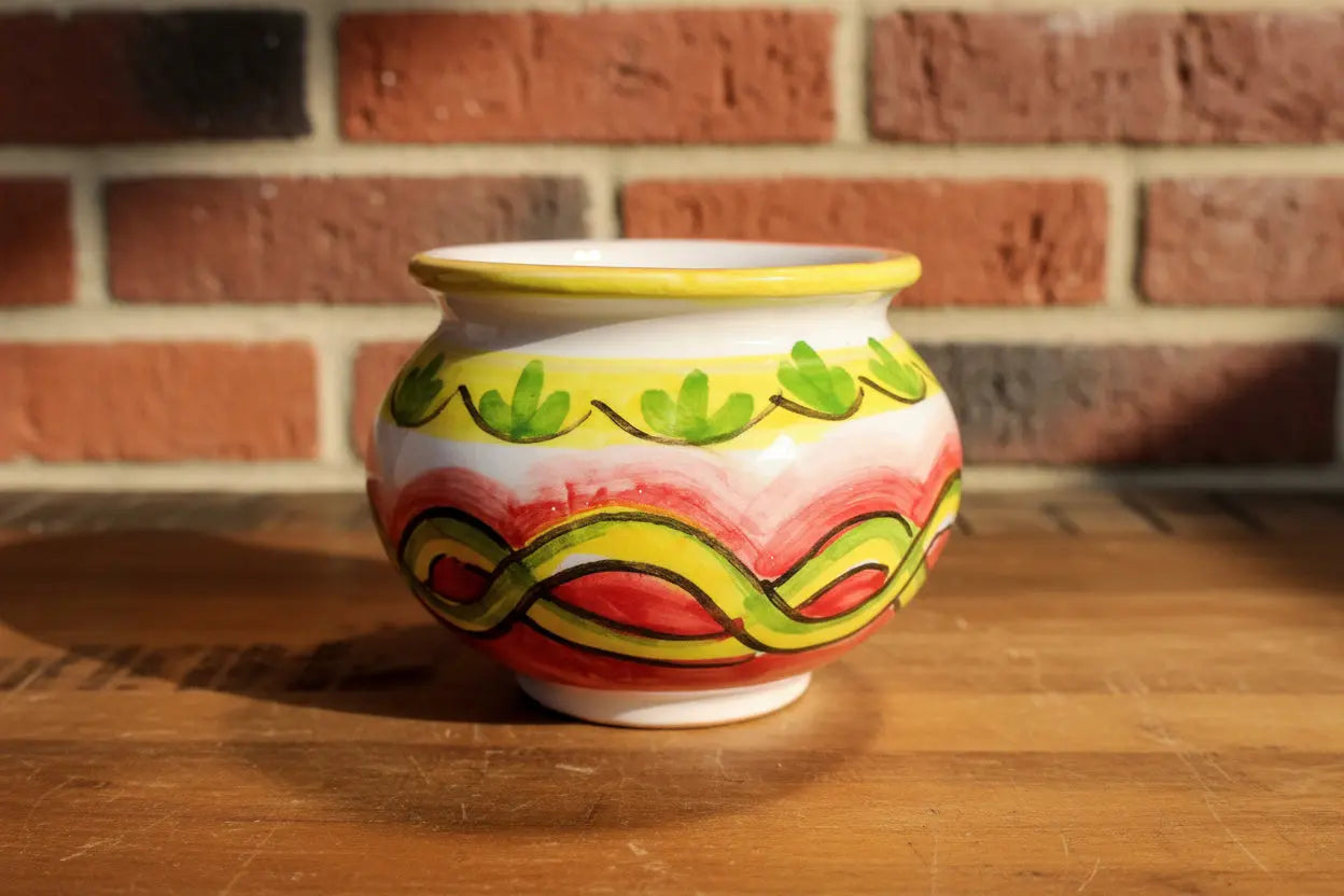 Decorative ceramic pot / planter / vase  with green leaves 
