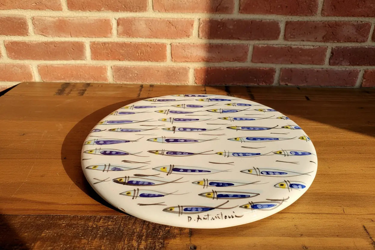 Round ceramic plate / trivet with fish pattern 