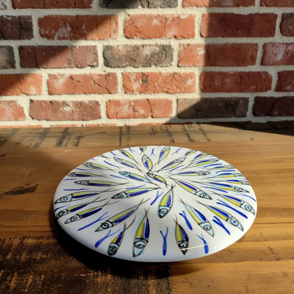 Round ceramic plate / trivet with fish design 