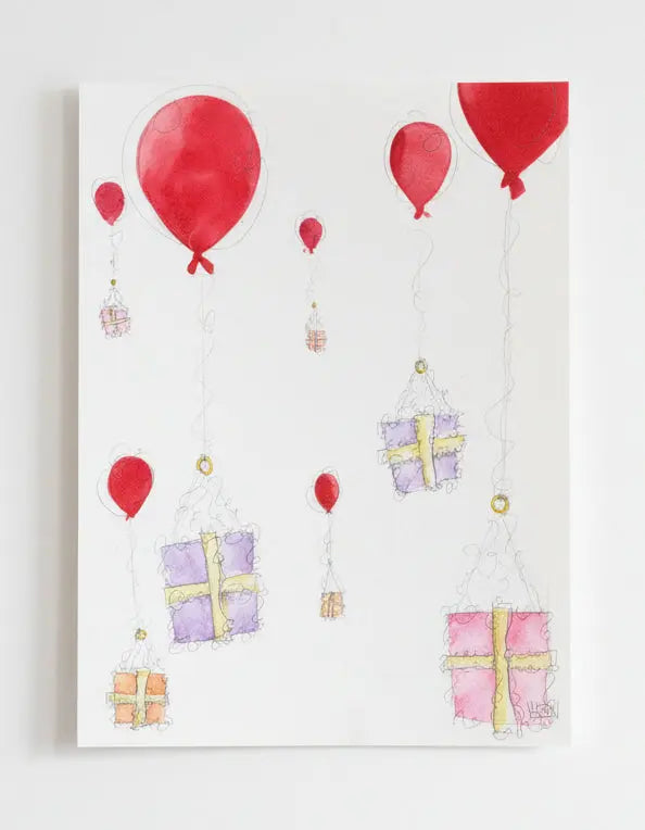 Framed artwork with red balloons and gift boxes on a light background