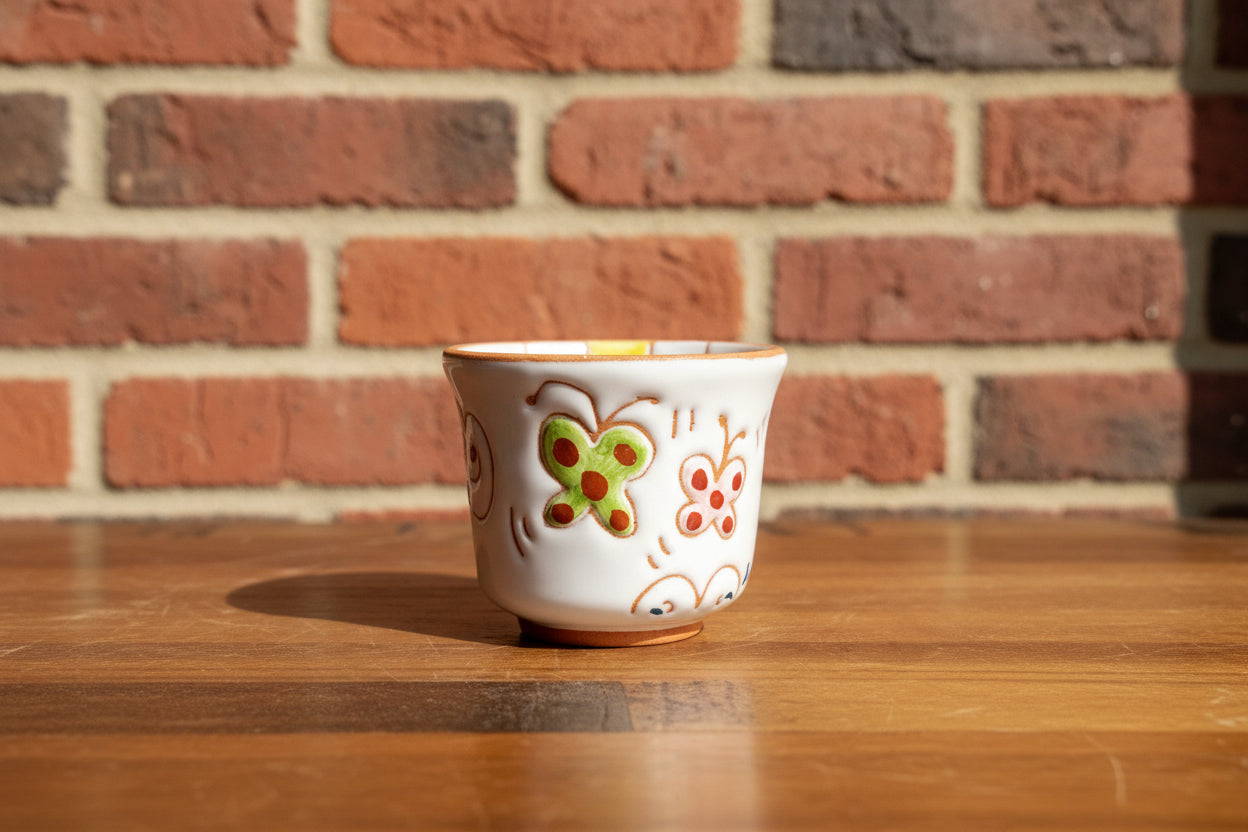 Ceramic espresso/coffee cup with butterfly design