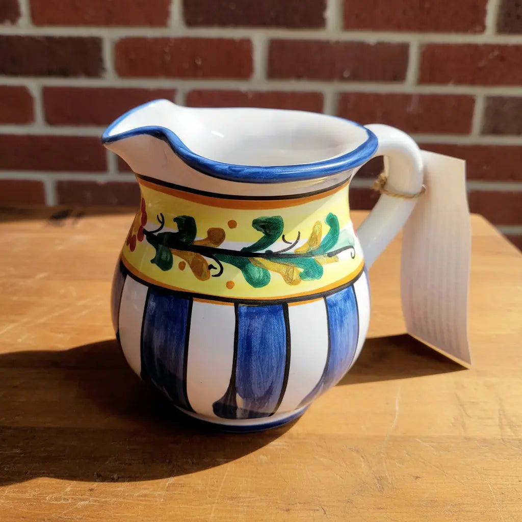 Decorative ceramic pitcher with colorful patterns 