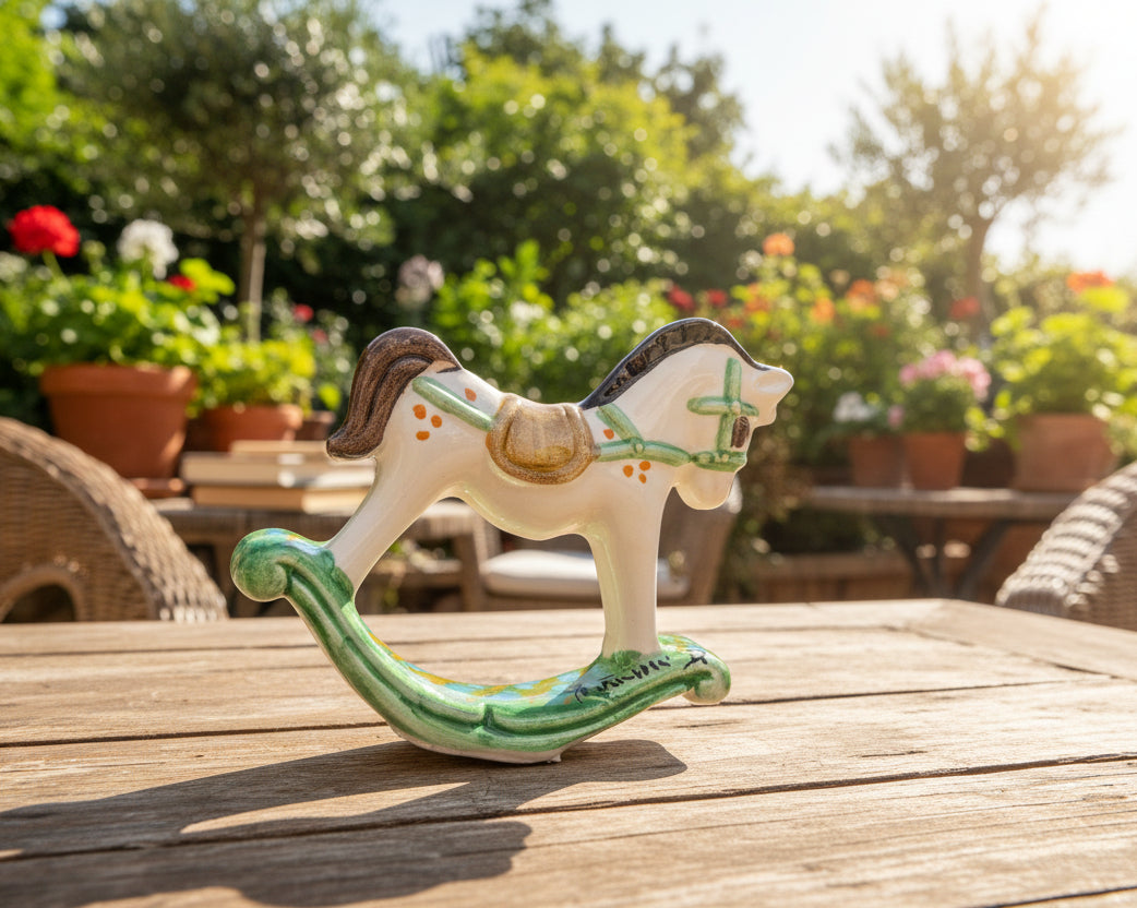 Decorative rocking horse figurine with green harness 