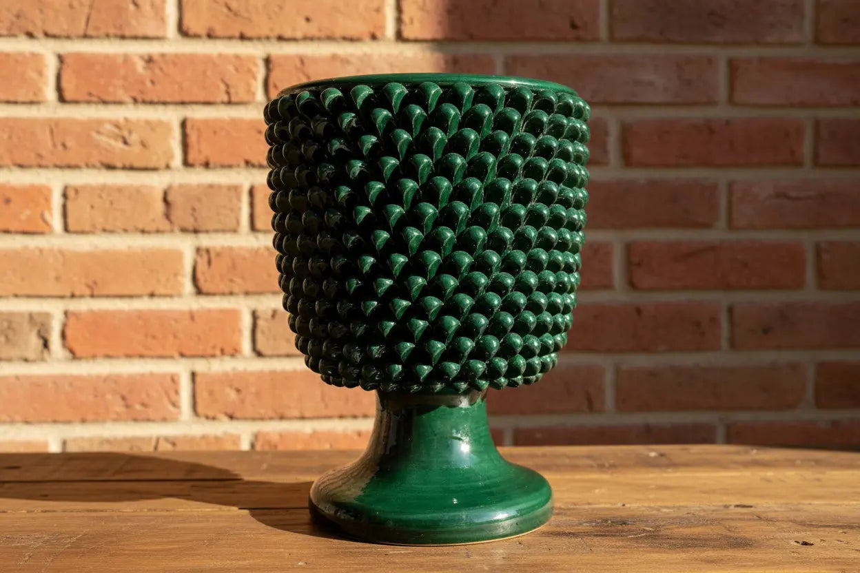 Green textured vase with pinecone base