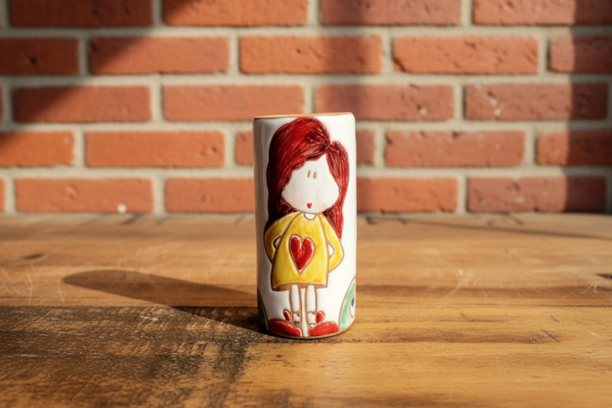 Decorative ceramic vase / toothbrush holder with a cartoon character