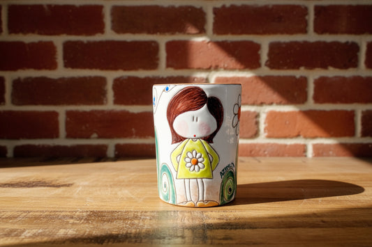 Decorative ceramic vase / toothbrush holder with a cartoon character
