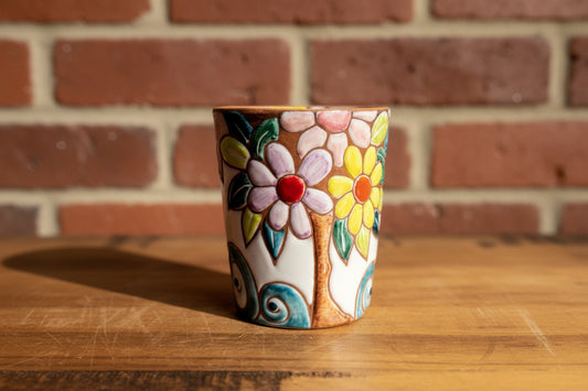 Decorative ceramic vase / toothbrush holder with a cartoon character