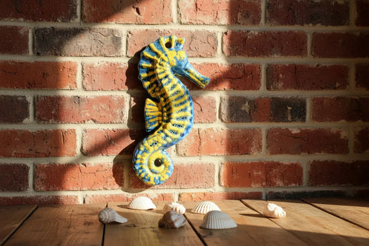 Decorative ceramic seahorse yellow and blue