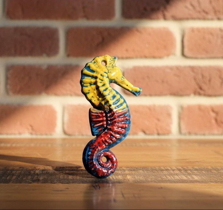 Decorative ceramic seahorse yellow and red